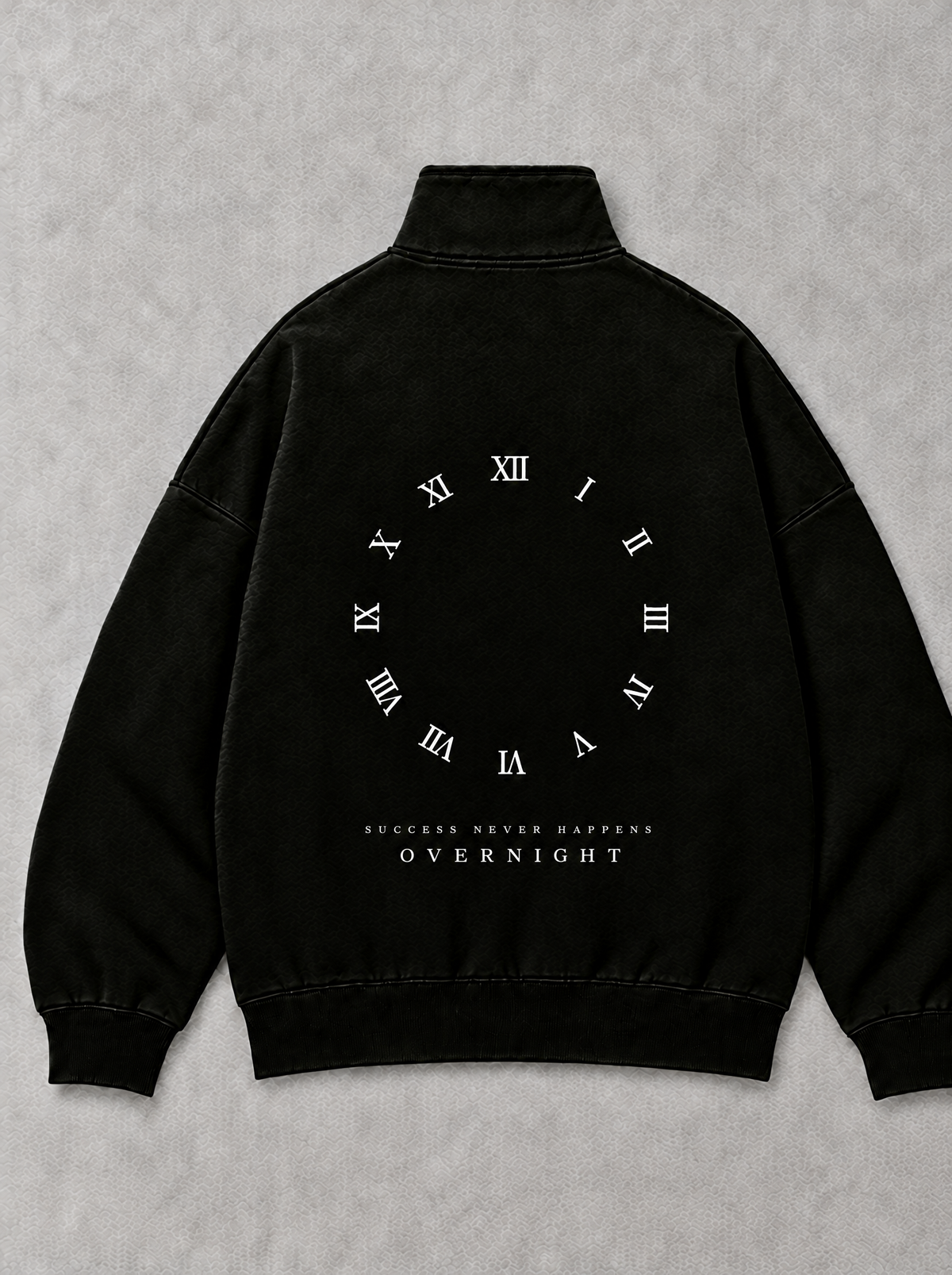 XI Quarter-Zip in Black, back flat lay: white Roman numeral ring with SUCCESS NEVER HAPPENS / OVERNIGHT