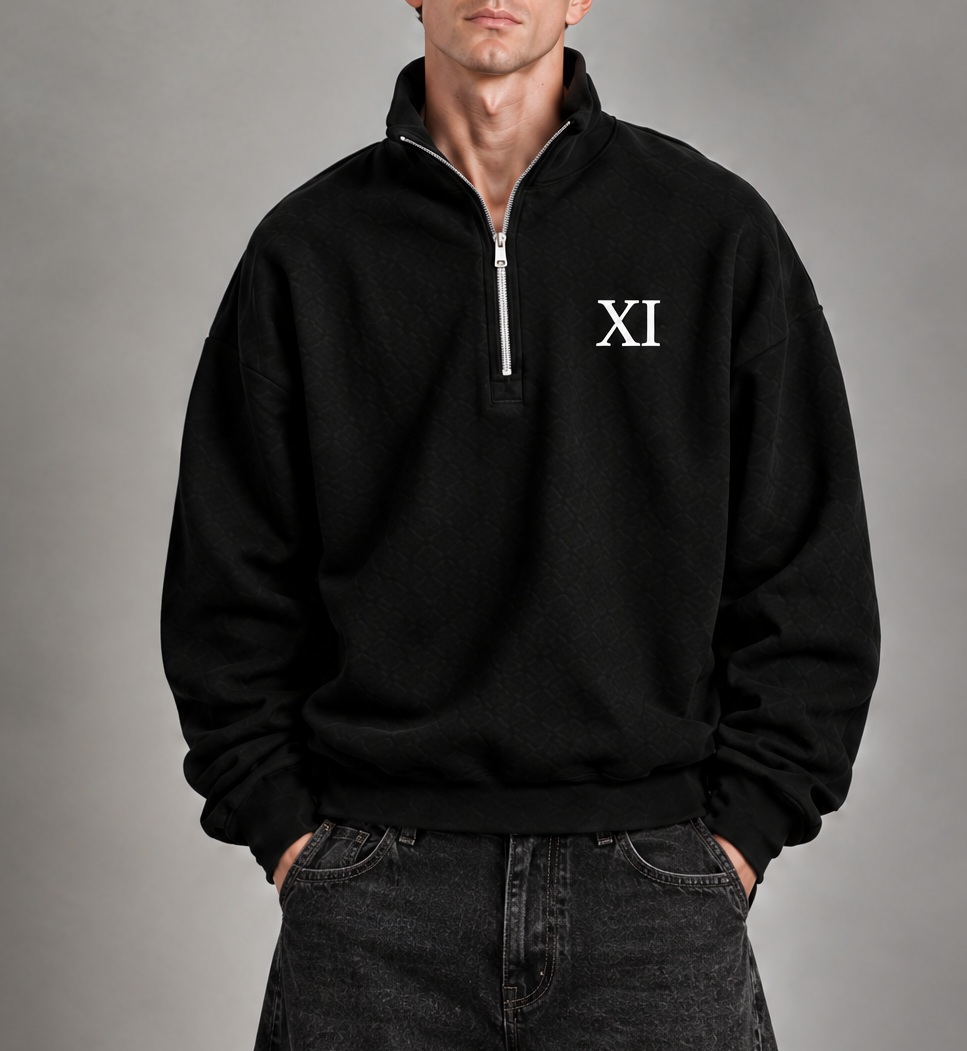 XI Quarter-Zip in Black, front view on model with black washed balloon-fit jeans