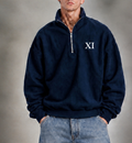XI Quarter-Zip in Midnight Navy with white XI, front view on model with light wash balloon-fit jeans