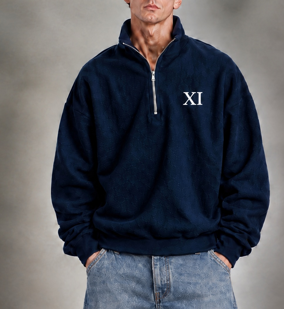 XI Quarter-Zip in Midnight Navy with white XI, front view on model with light wash balloon-fit jeans